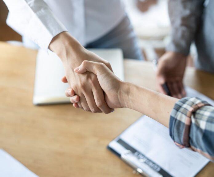 Partners,Corporate,Relationship,Concept.,Close,Up,Handshake,Of,Business,People